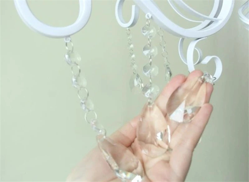 lustre vintage en cristal et fer forgé pour un éclairage élégant