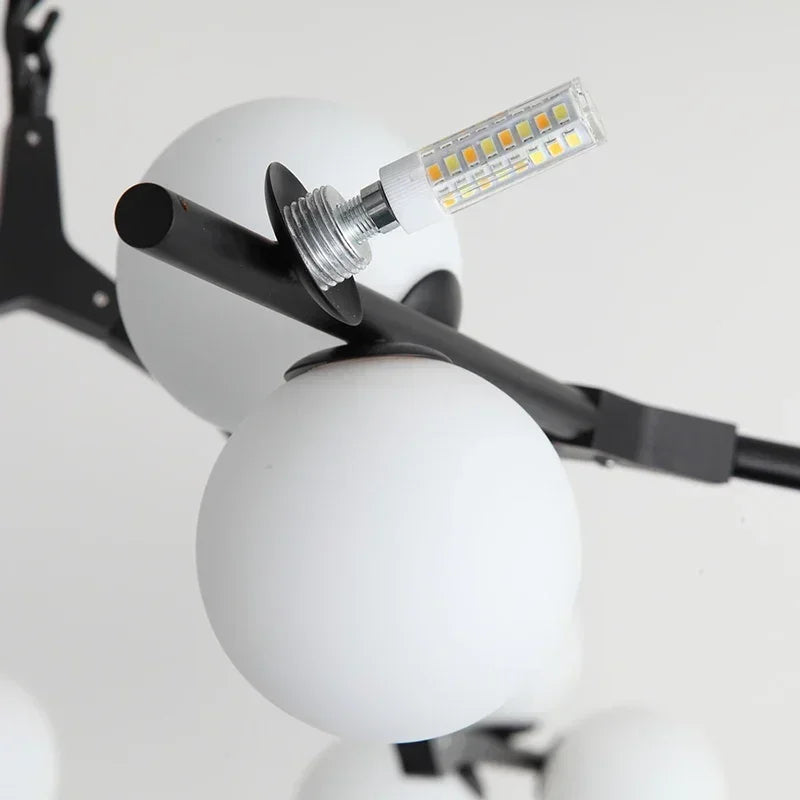 lustre moderne en verre avec branches led suspendues