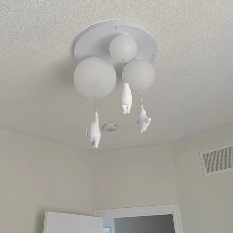 Suspension avec boule en verre et ours suspendu