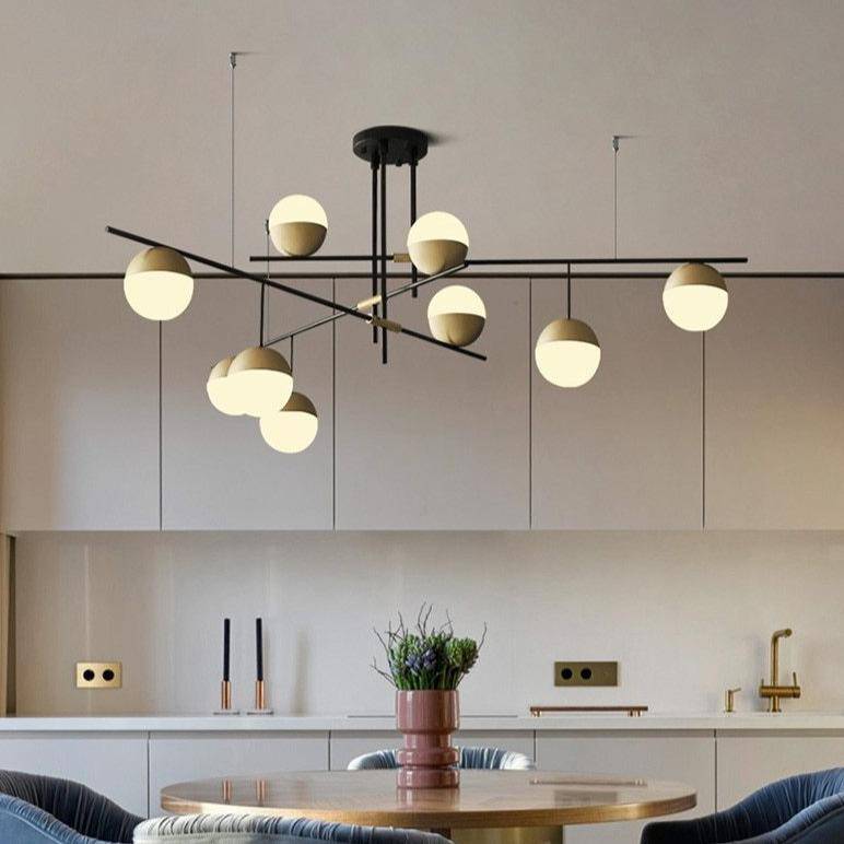 Lustre design avec branches et boules en verre et métal doré