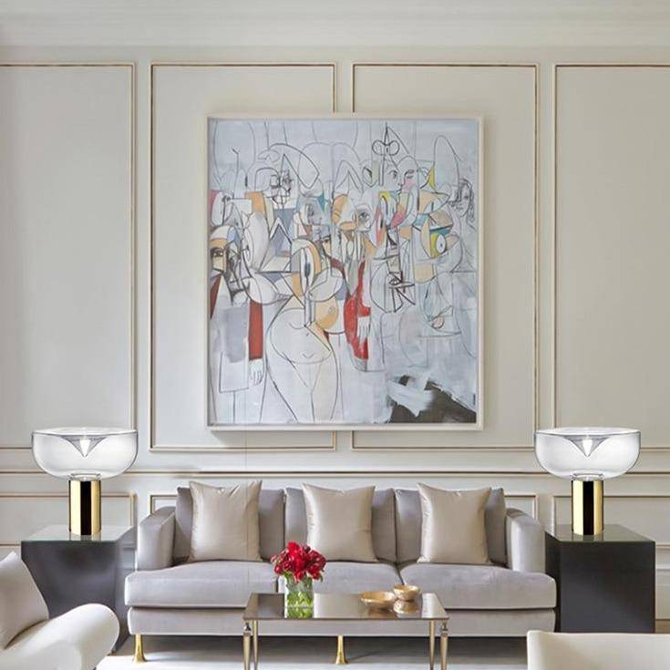 Lampe à poser design LED avec abat-jour arrondi et cylindre doré