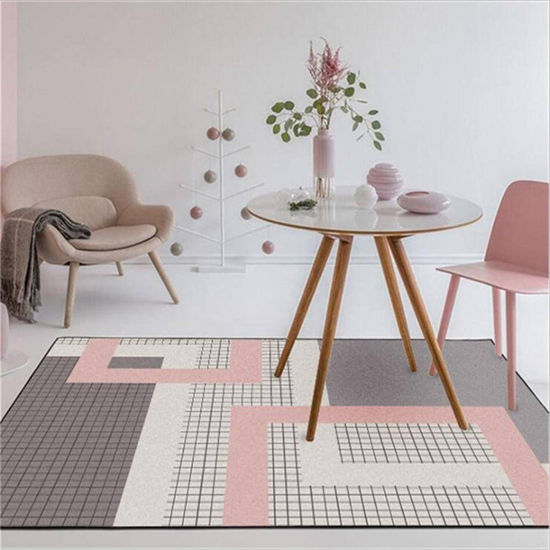 Tapis moderne gris et rose style géométrique