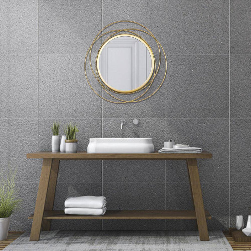 Miroir mural rond et anneaux dorés