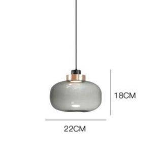 Suspension design LED avec sphère en verre et cercle cuivré
