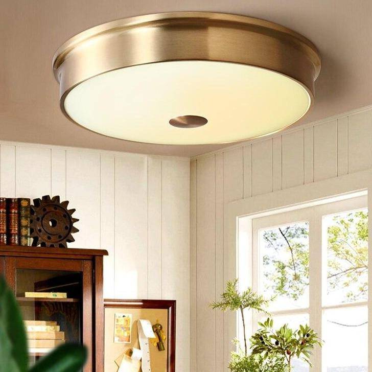 Plafonnier design LED rond en métal doré