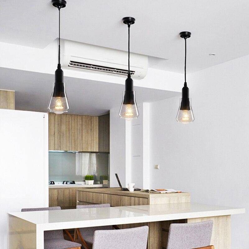 Suspension design LED noire avec abat-jour arrondie en verre