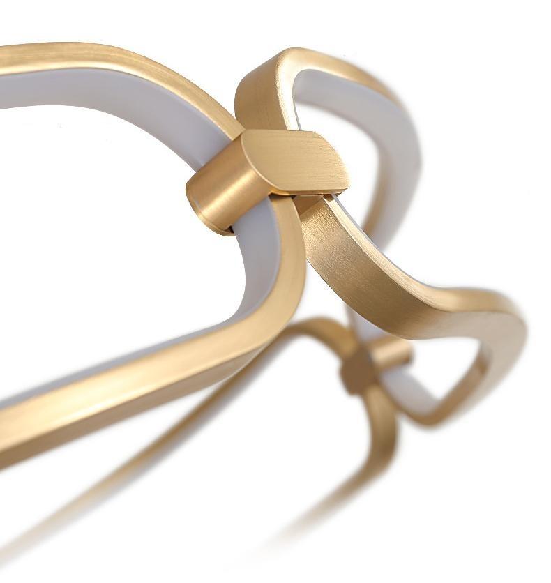 Lustre design à LED doré avec anneaux Pavia