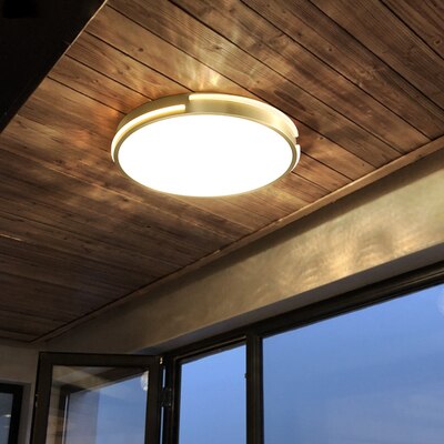 Plafonnier moderne circulaire et fin en métal doré Royss