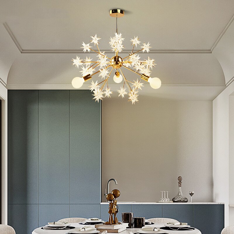 Lustre moderne métallique avec des étoiles étincelantes Tanit