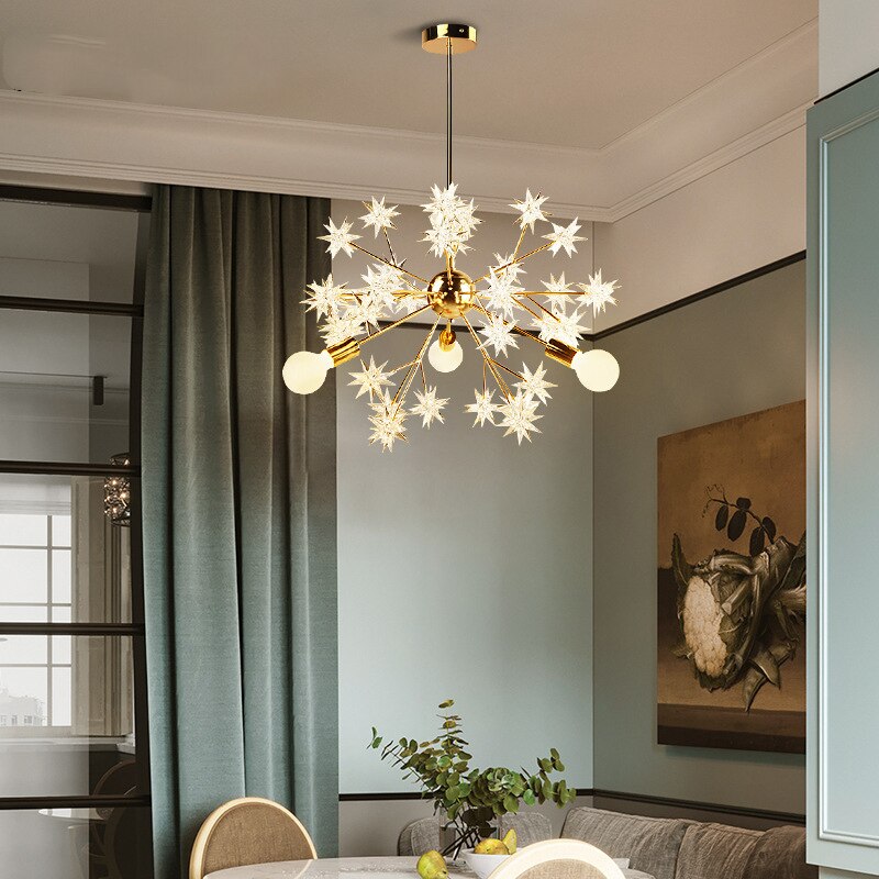 Lustre moderne métallique avec des étoiles étincelantes Tanit