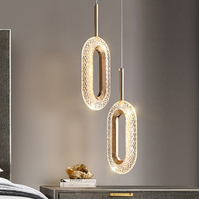 Suspension moderne LED forme ovale et dorée Elaia