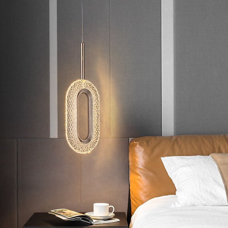 Suspension moderne LED forme ovale et dorée Elaia