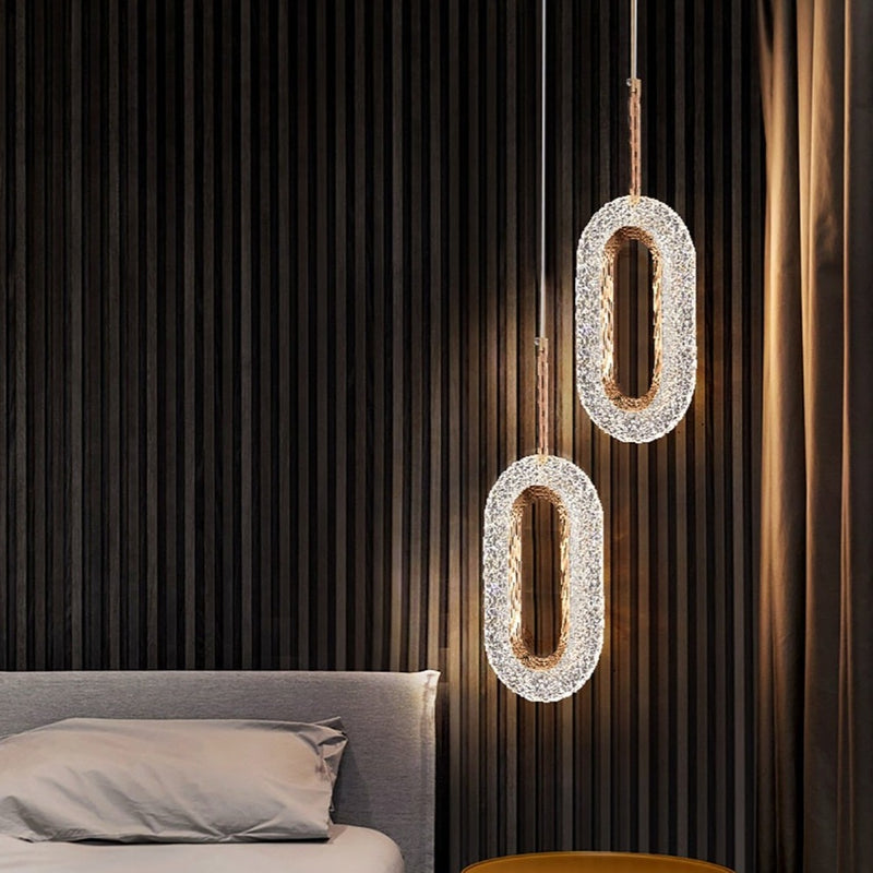 Suspension moderne LED forme ovale et dorée Elaia
