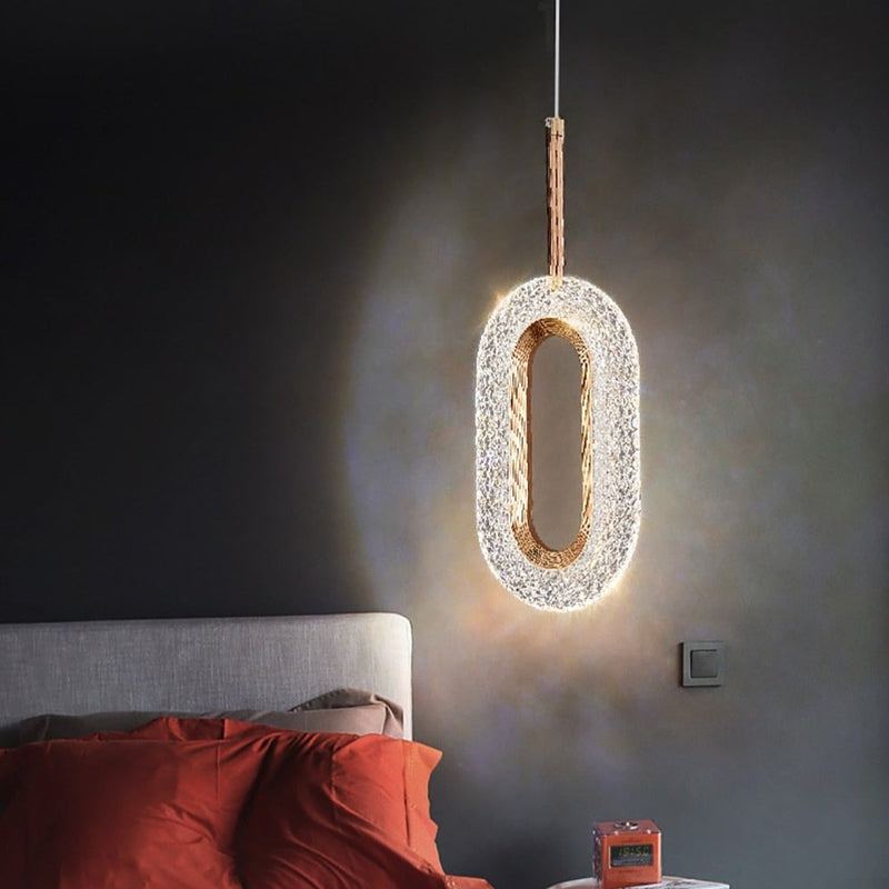 Suspension moderne LED forme ovale et dorée Elaia