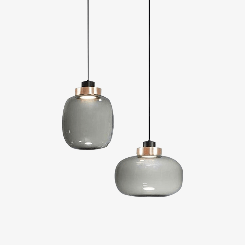 Suspension design LED avec sphère en verre et cercle cuivré
