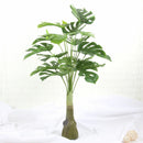Realistic artificial tropical plants for interior decoration