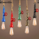 Vintage steampunk pendant light in industrial pipe and hemp rope