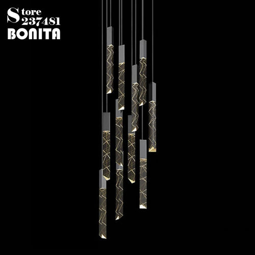 suspension moderne en cristal à long tube colimaçon sculpté