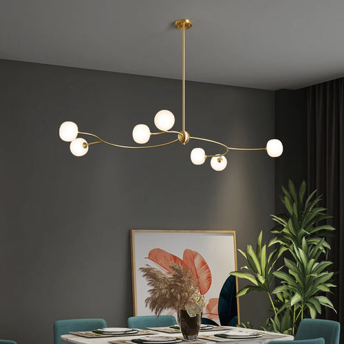 lustre de restaurant en cuivre design ambiance moderne pour intérieur