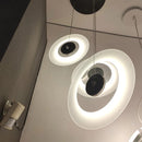 Minimalist round aluminium and glass pendant light for contemporary spaces