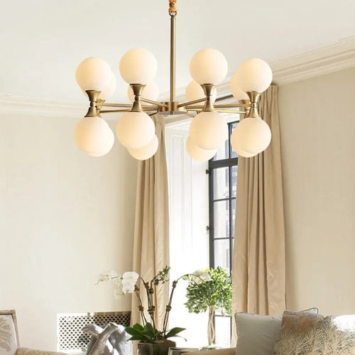 Lustre design doré style cuivre avec boules