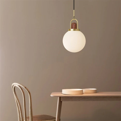 Nordic glass pendant light in minimalist style for modern interiors