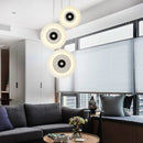 Minimalist round aluminium and glass pendant light for contemporary spaces