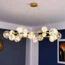 lustre moderne de luxe avec anneaux led et boule de verre