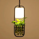 Suspension moderne en cage avec abat-jour en verre et fer