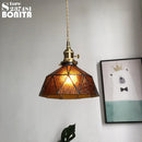 suspension en verre pur avec design ondulé en cuivre