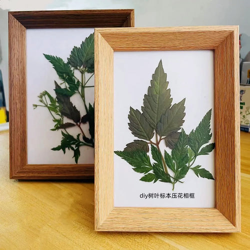 cadre photo en bois avec feuille décorative fait main - vue 3 sur 6