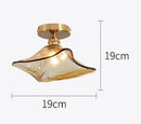 lustre en verre teinté pour un éclairage nordique élégant
