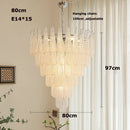 Coloured glass pendant with decorative leaf for chic interiors