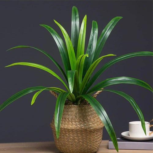 plantes artificielles de magnolia et feuilles tropicales pour décoration