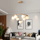 suspension en bois avec boule de verre design moderne