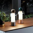Modern desk lamp with built-in USB charger and minimalist design