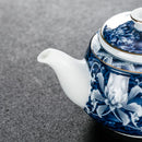 Théière chinoise traditionnelle porcelaine motifs artisanale portable