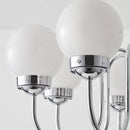 Minimalist glass and iron pendant light for medieval-inspired interiors