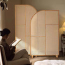 Japanese-style solid wood rattan screen partition is opposite the door to the home, living room entrance is blocked, and mobile