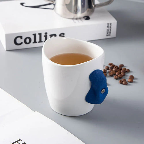 Tasse céramique poignée escalade design créatif moderne