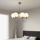 Minimalist glass and iron pendant light for medieval-inspired interiors