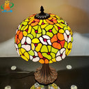 Tiffany style table lamp with decorative coloured glass flower