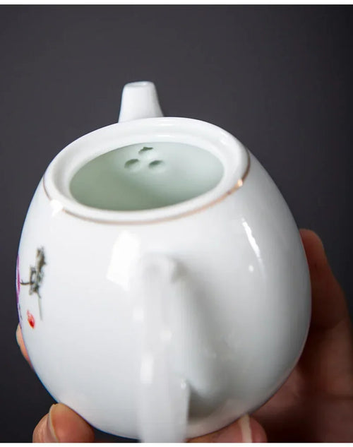 Théière porcelaine style yixing pour thé pu er