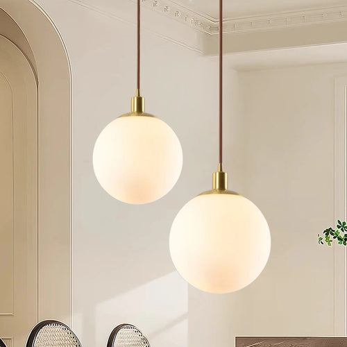 Modern minimalist brass pendant light with luminous orb - vue 2 sur 9