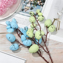 Easter decorations with branches and colourful eggs 2025