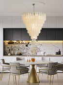 Coloured glass pendant with decorative leaf for chic interiors