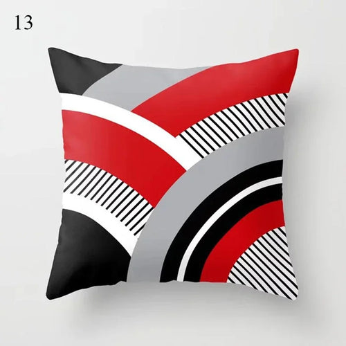 housse de coussin noire et rouge motif géométrique moderne