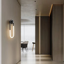 Minimalist ellipse wall light with three light colours