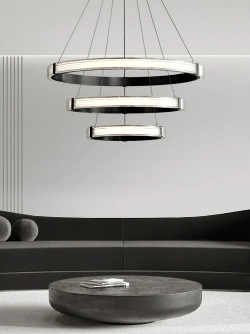 Modern circular acrylic pendant light for minimalist interior decor - vue 3 sur 9