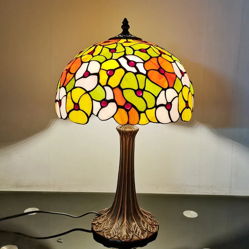 Tiffany style table lamp with decorative coloured glass flower